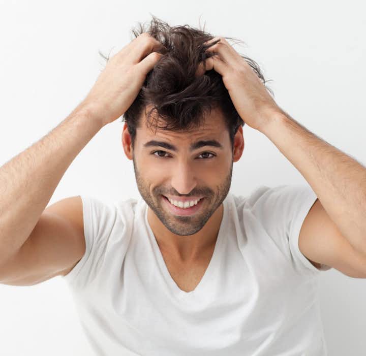 Is it normal to experience itching on the scalp after hair restoration in Dubai