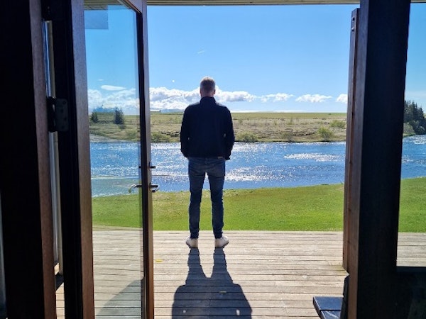 A guest enjoying the calming views of the West Ranga Lodge.