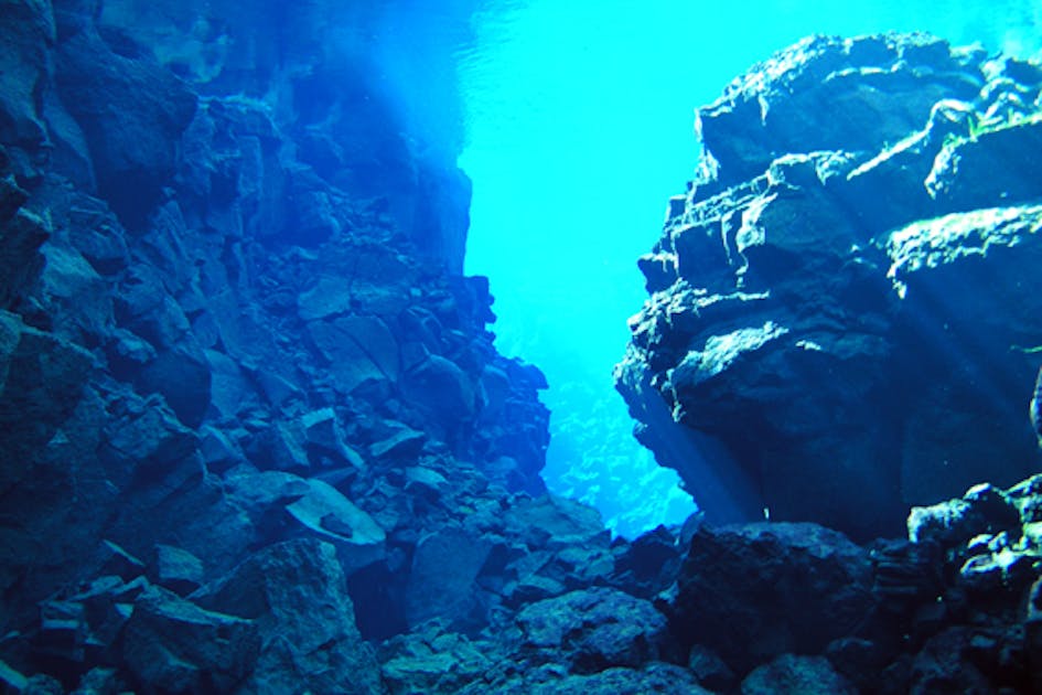 Scuba Diving In Silfra Fissure Deep Into The Blue