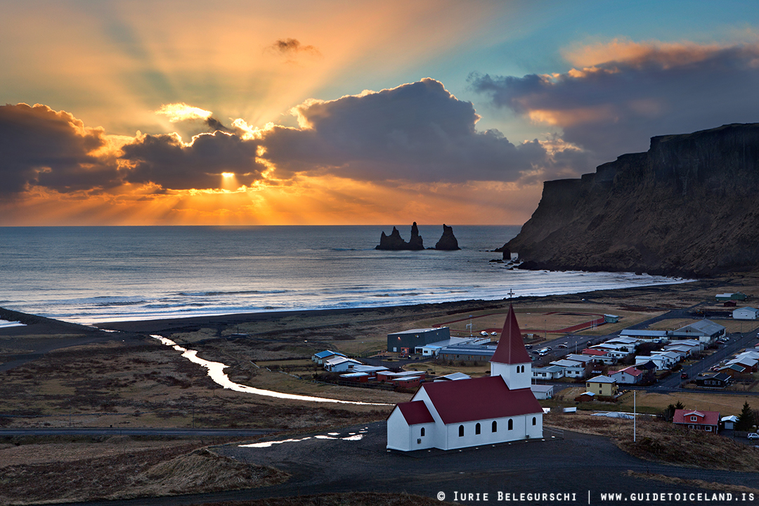 Dawn pouring over Vík on the South Coast of Iceland.