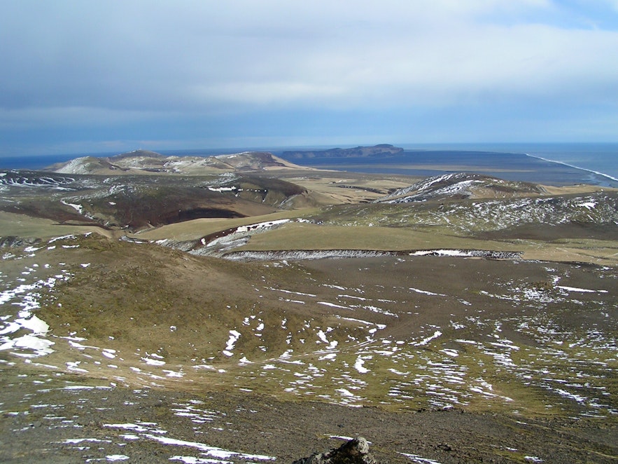 The surrounding landscapes of Hjorleifshofdi cape, with a sprinkling of snow.