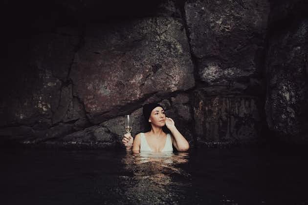 Indulge with a glass of champagne as you relax in the Sky Lagoon geothermal spa.