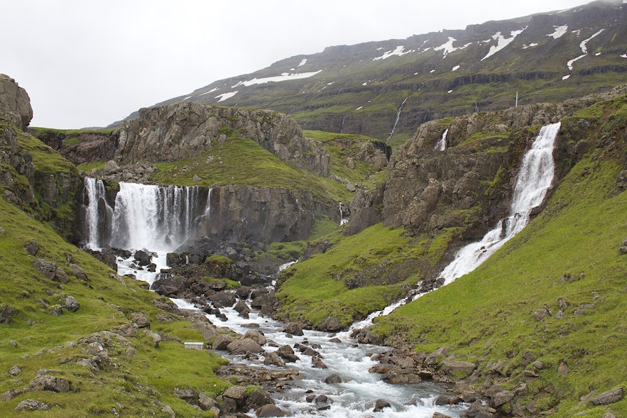 Vestdalsfossar features breathtaking views of cascading waterfalls against rugged cliffs and lush landscapes along the Vestdalsa River.