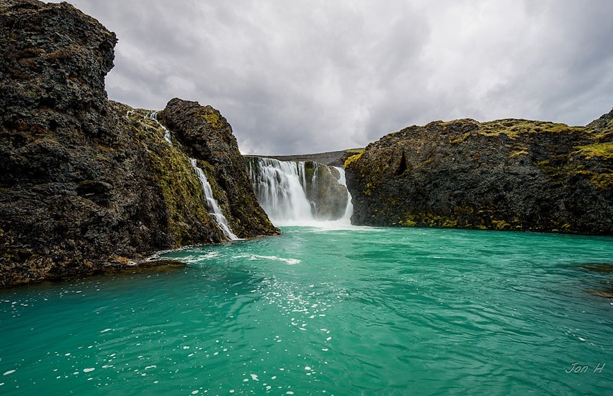 The blue waters of the Sigoldofuss waterfall in South Iceland.