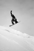 A snowboarder does an impressive jump at the Stafdalur Ski Station in the East Fjords.