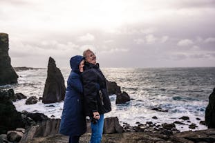 A couple posing for a photo on Reykjanes peninsula.