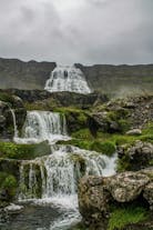 Dynjandi waterfall is one of the Westfjords most famous sites, a breathtaking cascade tumbling down a rocky hillside.