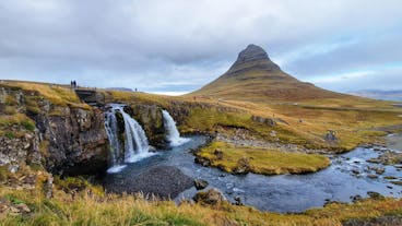 Kirkjufell mountain is one of Iceland's photography hotspots, with its cone-shaped peak and picturesque foreground waterfall.