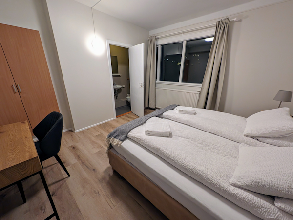 Every room at the Stykkisholmur Inn has comfortable beds with blankets.