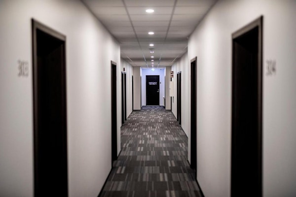 A hallway leading to rooms at 201 Hotel in Kopavogur.
