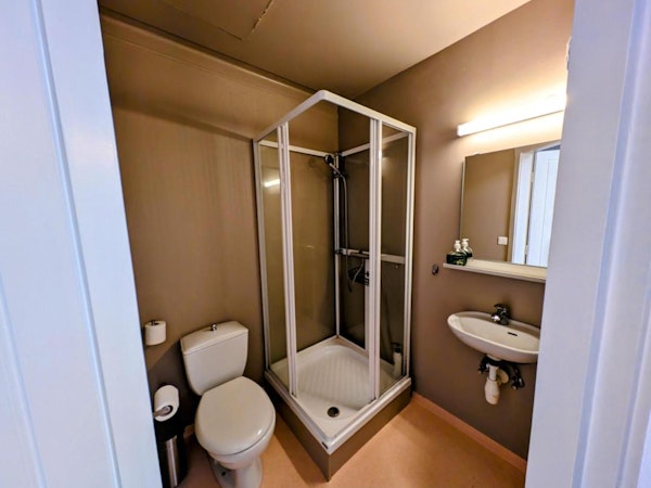 A photo of the private bathroom with shower of the Stykkisholmur Inn in Snaefellsnes.
