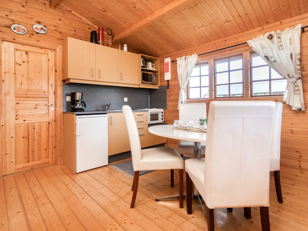 The Sireksstadir cottages have kitchens and dining tables.