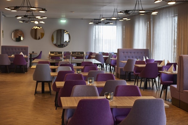 The restaurant dining area at Hotel Vesturland in Borgarnes.