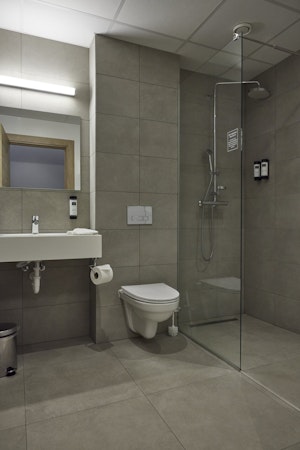 All the bathrooms at Hotel Vesturland have a walk-in shower.