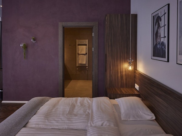 A comfortable and elegant room at Hotel Vesturland with a private bathroom.