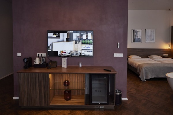 Relax in front of your flatscreen television at Hotel Vesturland.