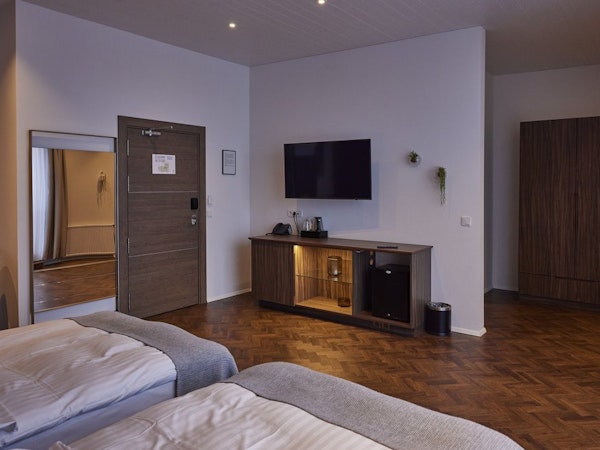 The rooms at Hotel Vesturland are spacious and have practical amenities.