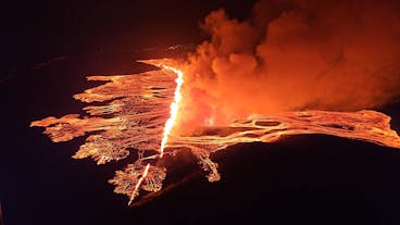 You may see the Sundhnukagigar eruption from a distance by the Reykjanes Volcano Area
