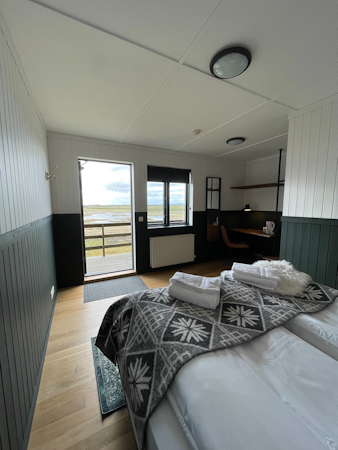 An original twin room in Aurora Lodge Hotel can be converted into a double room.