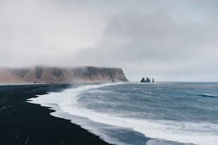 Reynisfjara beach in Iceland has long stretches of volcanic sands.