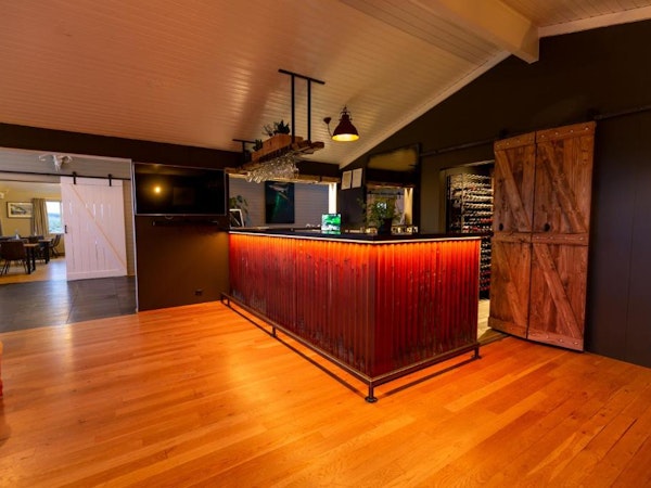 Guests of Aurora Lodge Hotel can enjoy a few drinks at the in-house bar.