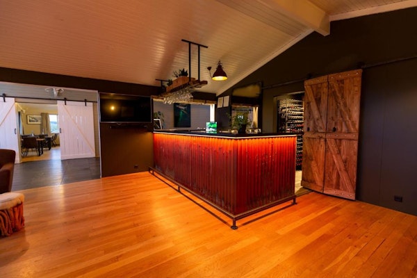 Guests of Aurora Lodge Hotel can enjoy a few drinks at the in-house bar.