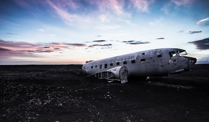 The DC plane wreckage in South Iceland under the midnight sun.