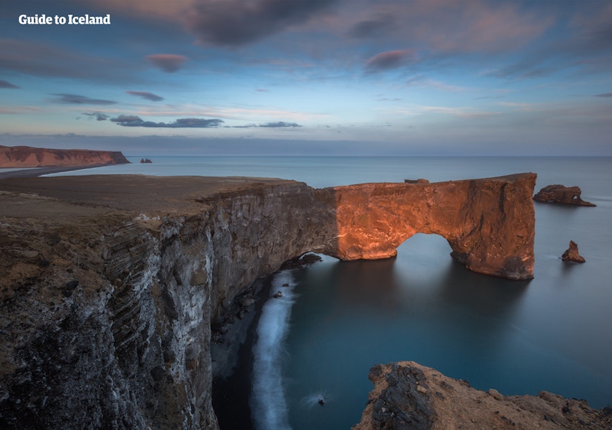 The Dyrholaey nature reserve boasts stunning panoramic views, including a volcanic rock arch jutting into the sea.