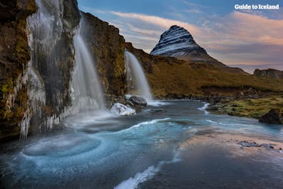 Kirkjufell, on the northern edge of the Snaefellsnes Peninsula, has an adjacent waterfall called Kirkjufellsfoss.