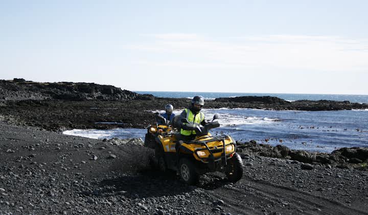 The black sands of Iceland make for a great open space for ATV rides.