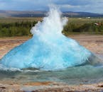 Visit the Geysir geothermal area and see the geyser Strokkur erupt!