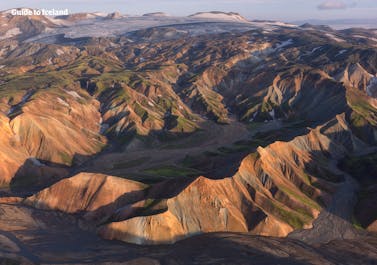 Landmannalaugar boasts rhyolite mountains in vibrant colors and excellent hiking trails in the Icelandic Highlands.