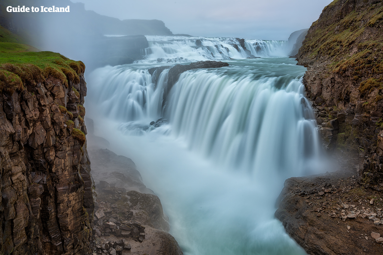 Hear the thundering noises of Gullfoss waterfall as water tumbles down 32-metres into an ancient canyon