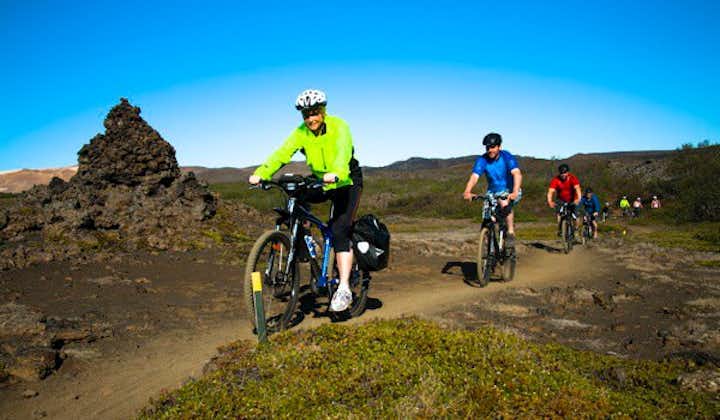 Guests ride fat tire mountain bikes through the North Iceland landscape on this bike tour of Lake Myvatn.