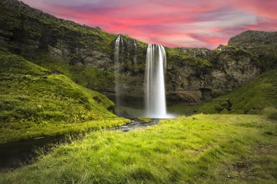 The picturesque Seljalandsfoss waterfall is one of the best-known falls in Iceland.