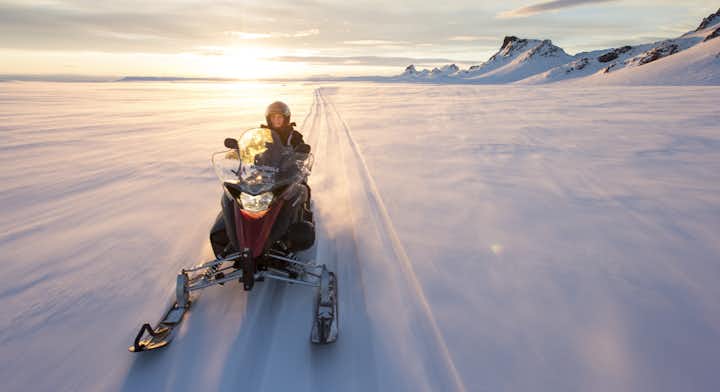 Enjoy your snowmobile adventure on top of Langjökull Glacier in Iceland.