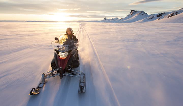 Enjoy your snowmobile adventure on top of Langjökull Glacier in Iceland.