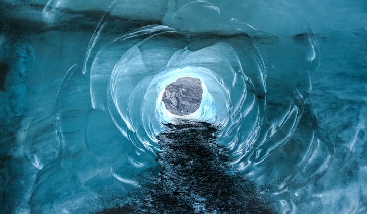 Stepping into an ice cave of Vatnajökull in Iceland is like entering another world.