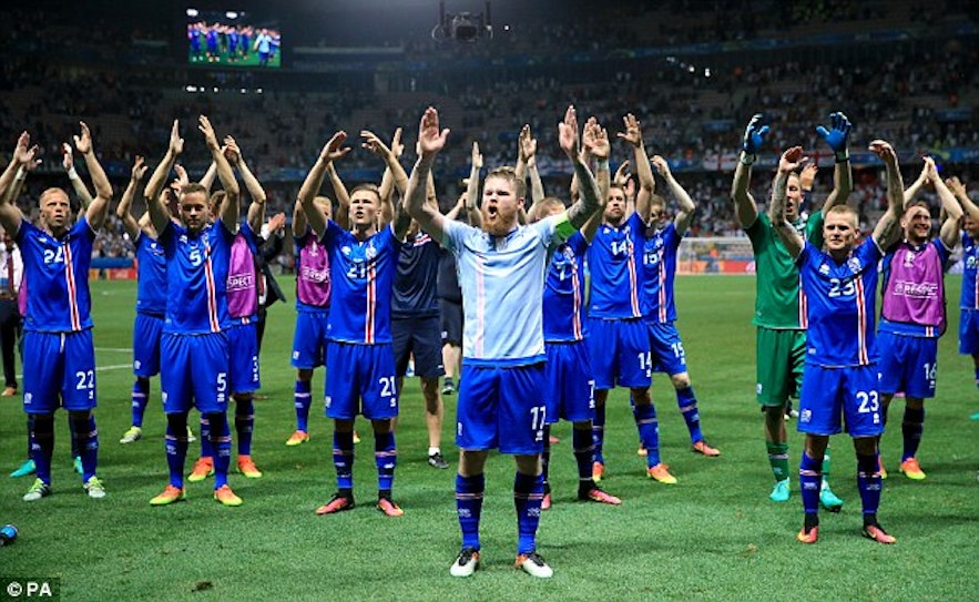 Icelandic team celebrates with Viking chant and their fans