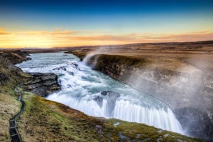The magnificent Gullfoss waterfall crashes into the canyon below.