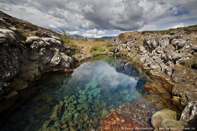 The clear waters of Silfra fissure in the Thingvellir National Park.