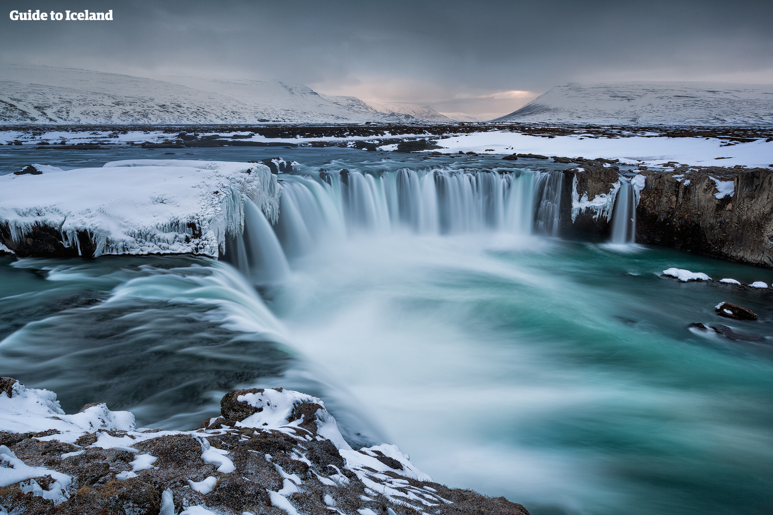 Almost exactly halfway between Akureyri and the Mývatn area is the horseshoe-shaped waterfall Goðafoss.