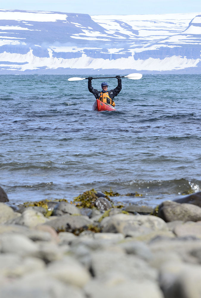 Enjoy the sense of victory that comes after a long kayaking experience in the Westfjords, when you reach a new, beautiful spot in the Hornstrandir Nature Reserve.
