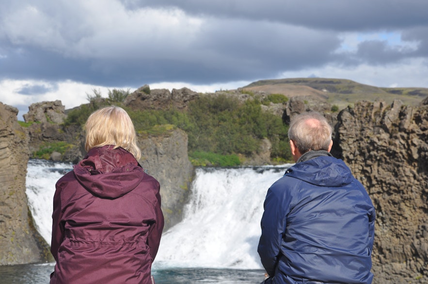 Admiring the Hjálp waterfall in Iceland