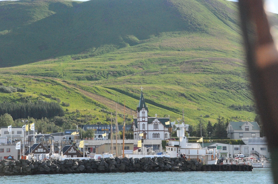 View of Húsavík from our sailboat with North Sailing