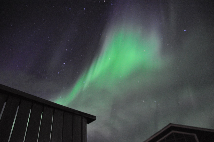 Auroras over Lamb-inn guesthouse by Akureyri