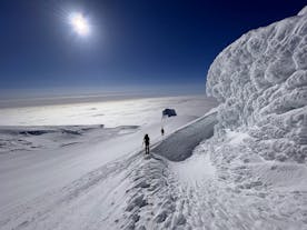 Hikers atop the Hvannadalshnukur peak in Oraefajokull.