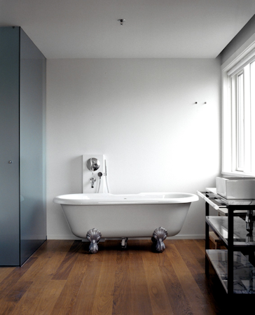 A stylish bathtub adds a touch of luxury to your room at 101 Hotel Reykjavik.