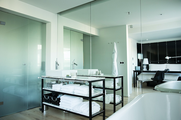 Enjoy a touch of luxury with an in-room bathtub and quality towels at 101 Hotel Reykjavik.