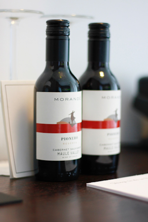 Small bottles of red wine in a room at Center Hotels Arnarhvoll.